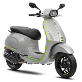 Gray scooter with green accents on a white background